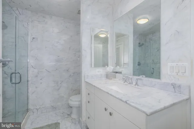a bathroom with a bathtub and a sink