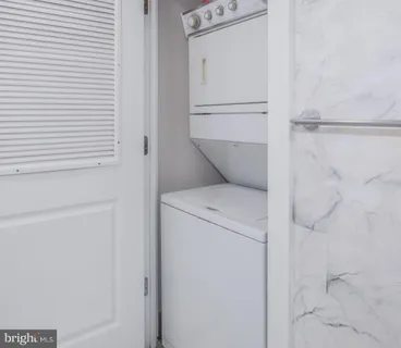 a room with a table and chairs