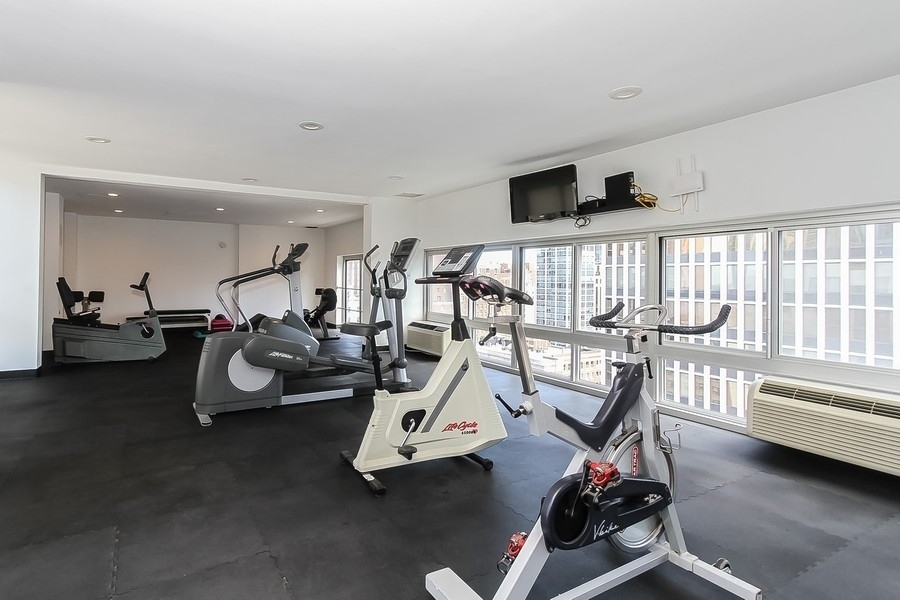 1221 North Dearborn Parkway, Unit PH10N Chicago, IL 60610 - Photo 21 of 23 a view of a room with gym equipment
