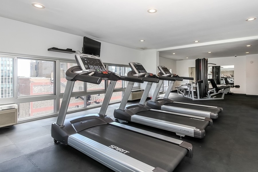 1221 North Dearborn Parkway, Unit PH10N Chicago, IL 60610 - Photo 22 of 23 a view of a room with gym equipment