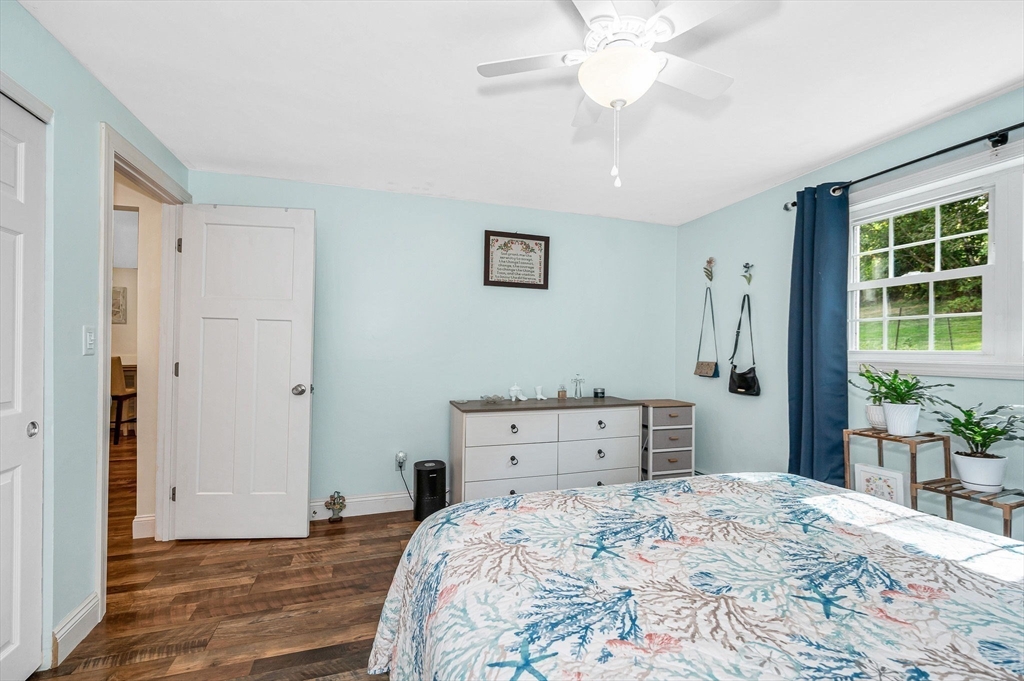 1 Brown Avenue, Unit 380 Amesbury, MA 01913 - Photo 16 of 25 a bedroom with a bed and a window