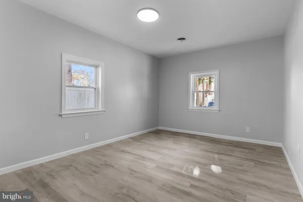 a view of a room that has a window in it