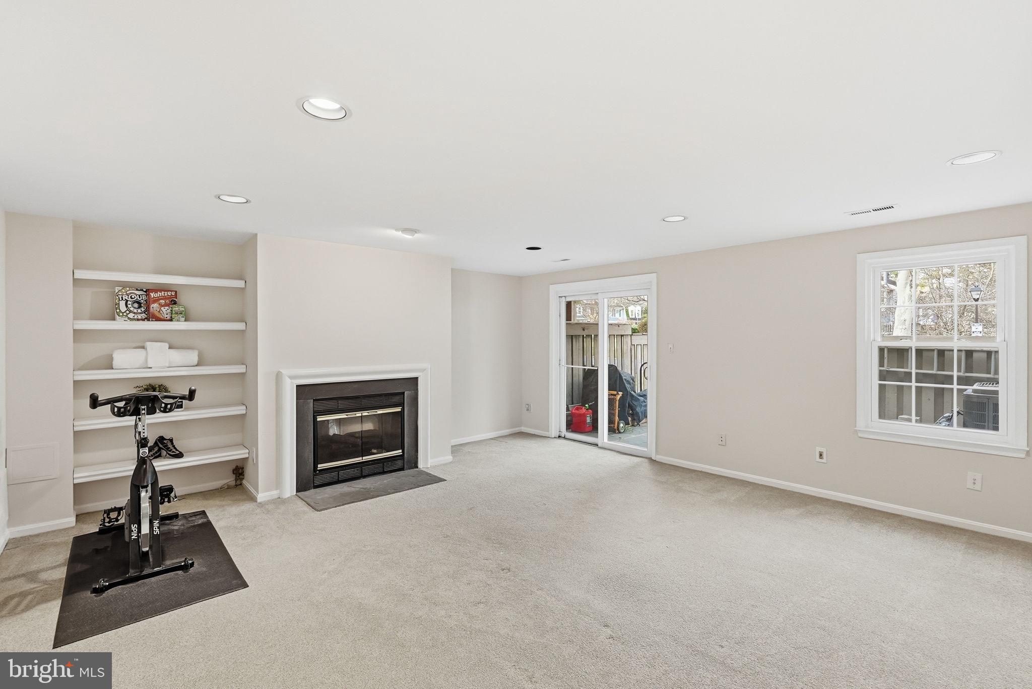 8647 Hawk Run Terrace Gaithersburg, MD 20886 - Photo 18 of 22 Walk-Out Lower Level with Fireplace
