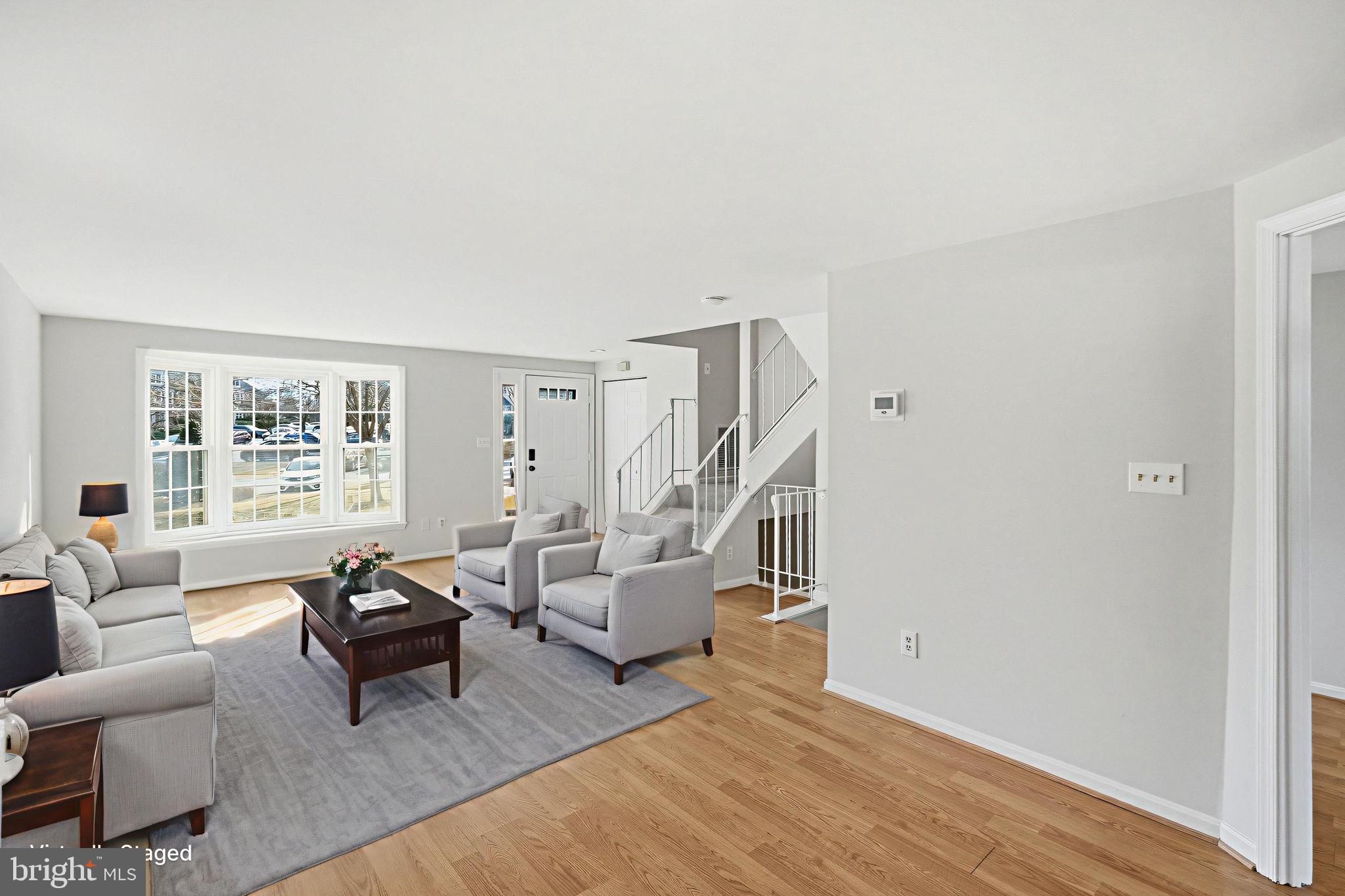 8647 Hawk Run Terrace Gaithersburg, MD 20886 - Photo 3 of 22 Living Room Reverse