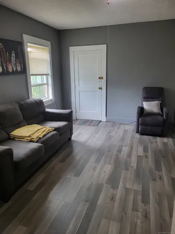 a bedroom with a bed and dresser