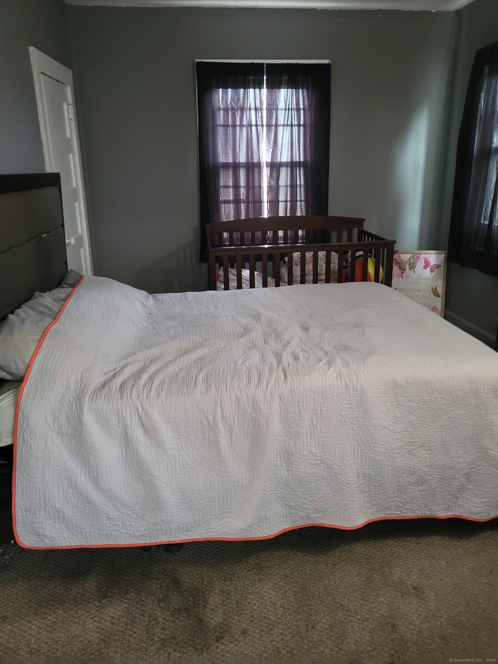 Undisclosed Address Bridgeport, CT 06607 - Photo 8 of 10 a bedroom with a bed and window