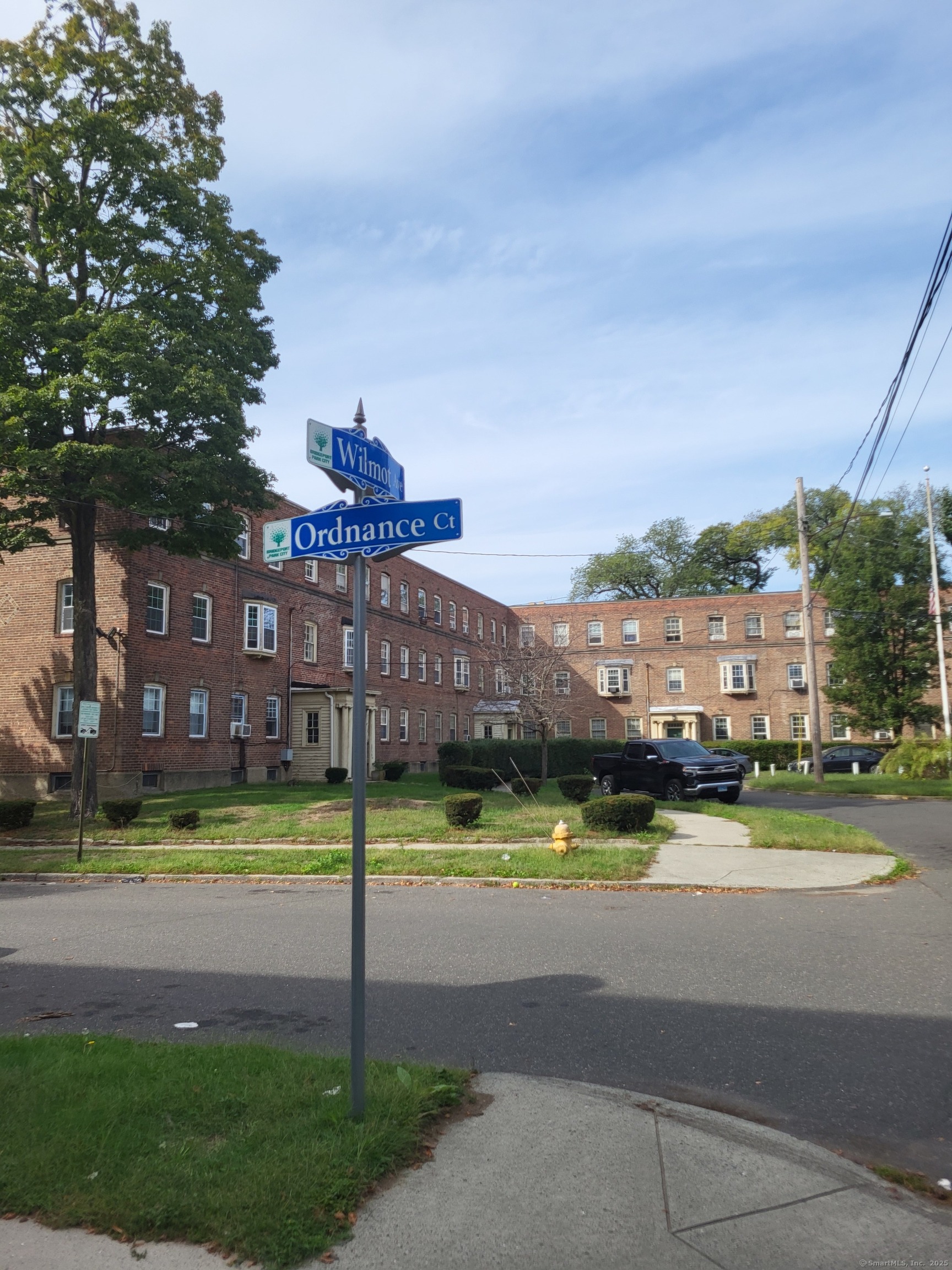 Undisclosed Address Bridgeport, CT 06607 - Photo 10 of 10 a view of a big house with a big yard and palm trees