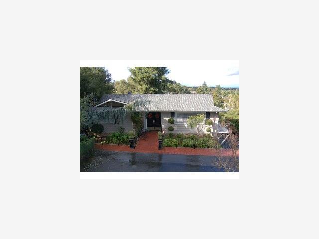 893 Madonna Way Los Altos, CA 94024 - Photo 1 of 8 a picture of a bench in front of a building