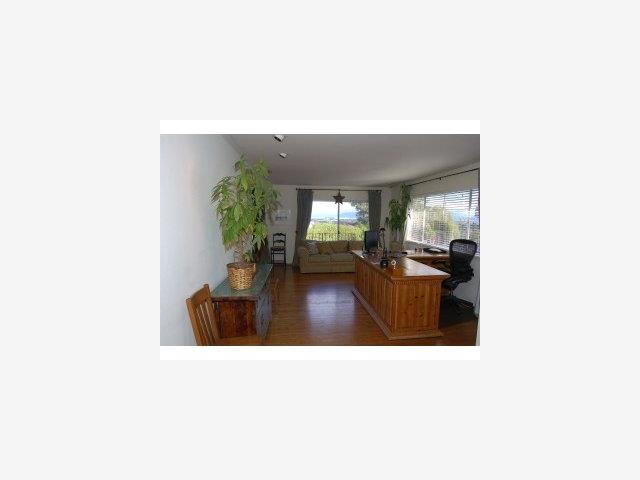 893 Madonna Way Los Altos, CA 94024 - Photo 2 of 8 a living room with furniture and a potted plant