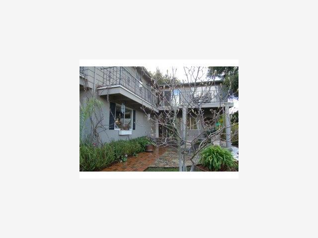 893 Madonna Way Los Altos, CA 94024 - Photo 7 of 8 a picture of a bench in middle of a house