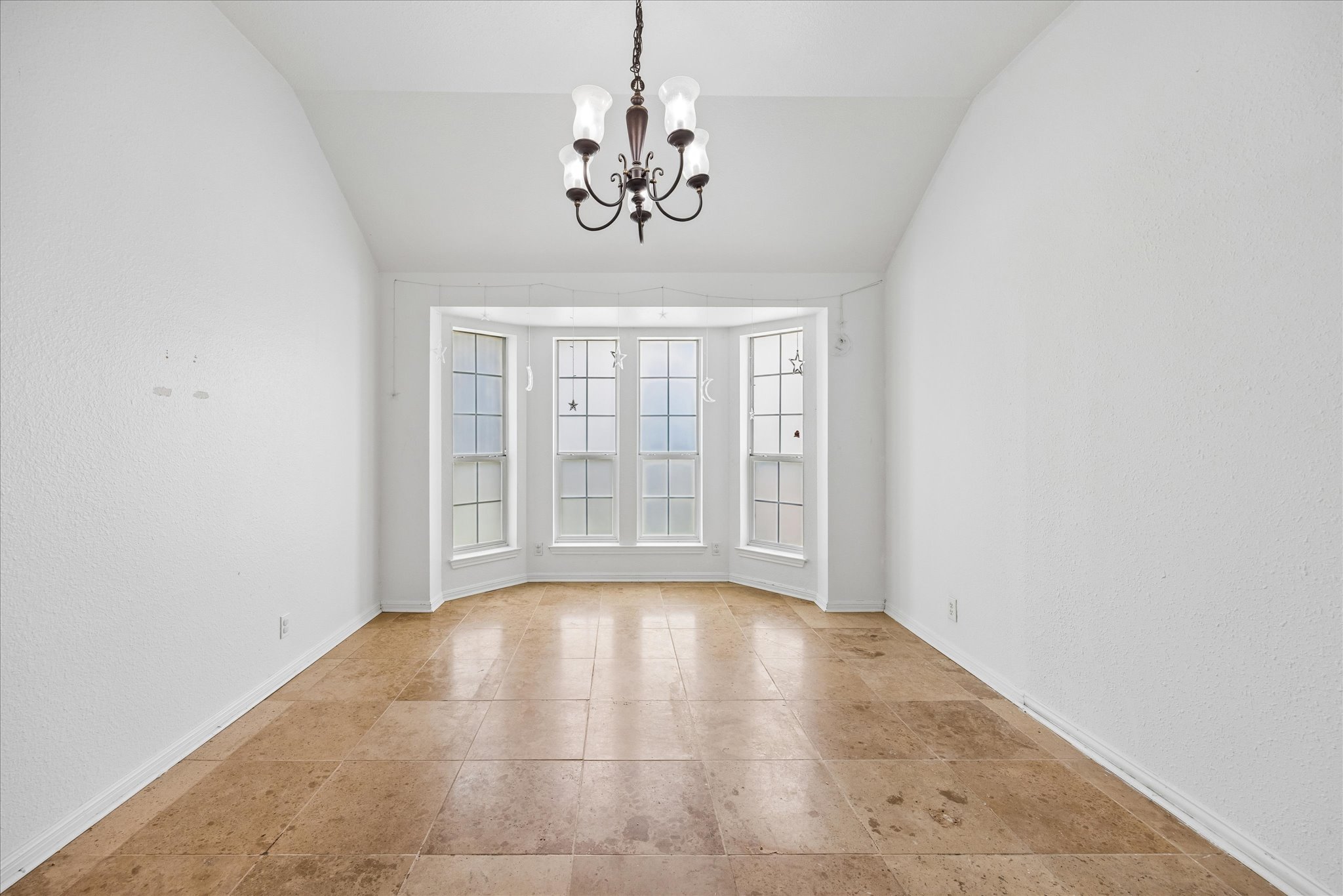 124 Lago Grande Drive Kyle, TX 78640 - Photo 6 of 16 Bay window with multiple panes and white framing