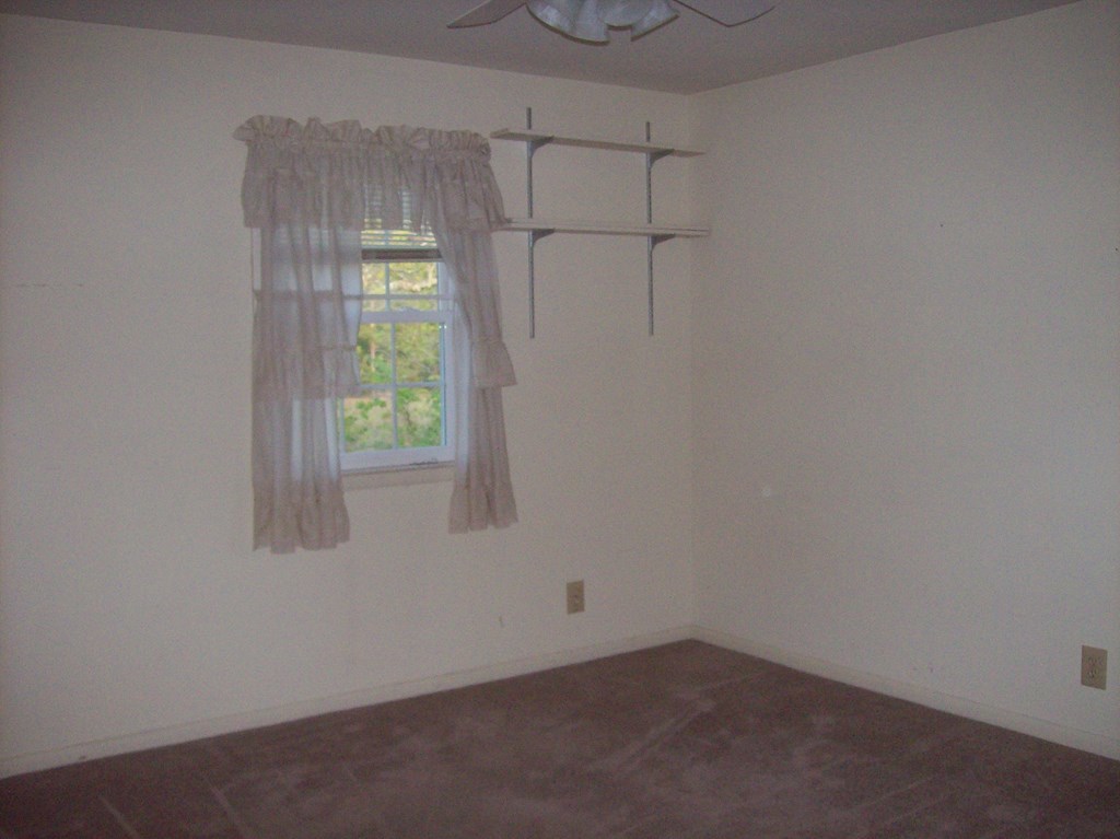 236 Chambers Road Macon, GA 31217 - Photo 13 of 29 a view of an empty room with a window