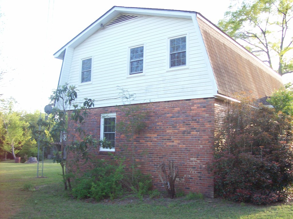 236 Chambers Road Macon, GA 31217 - Photo 19 of 29 a view of a house with a yard