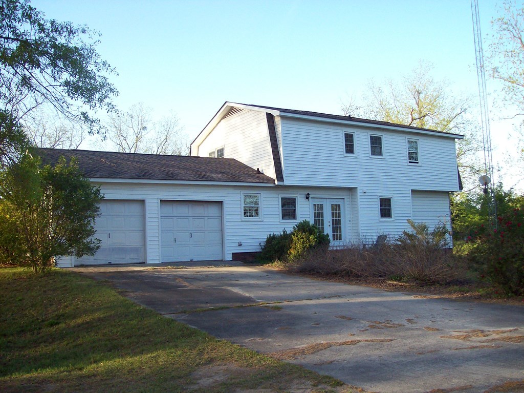 236 Chambers Road Macon, GA 31217 - Photo 20 of 29 a front view of a house with a yard