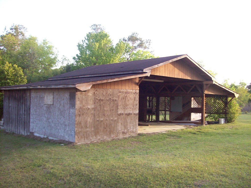236 Chambers Road Macon, GA 31217 - Photo 23 of 29 a front view of a house with a yard