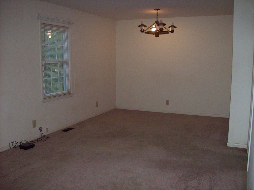 236 Chambers Road Macon, GA 31217 - Photo 7 of 29 an empty room with windows