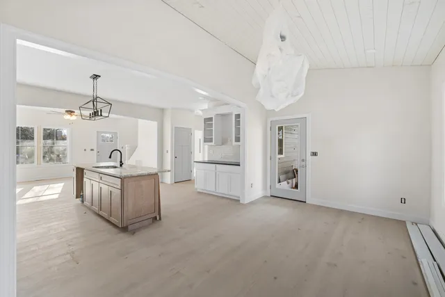 a view of a kitchen with furniture and window