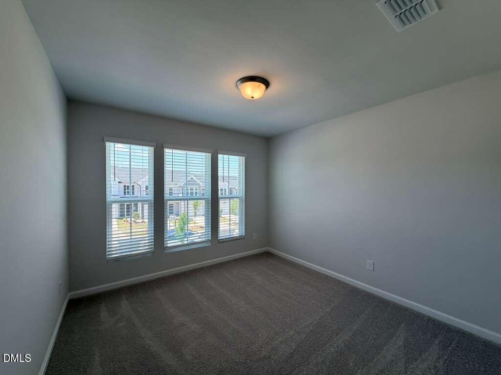 5024 Reader Way Durham, NC 27703 - Photo 21 of 26 an empty room with a window