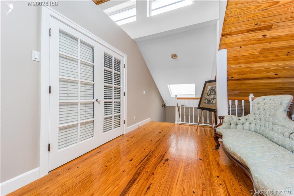 669 Southwest Linden Street Stuart, FL 34997 - Photo 14 of 43 Main Bedroom Landing Room. French doors open to the main bedroom