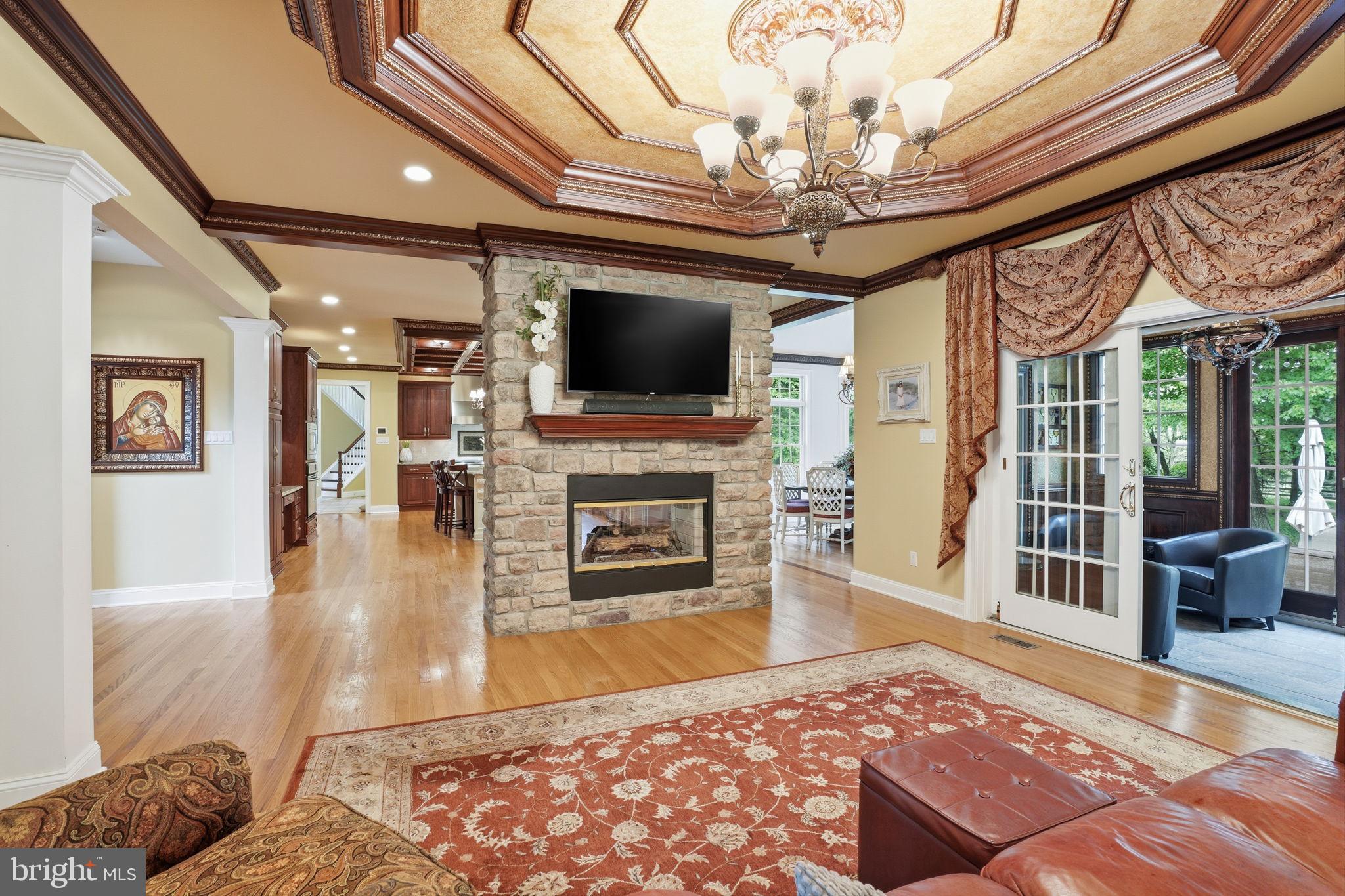 1588 Wrightstown Road Newtown, PA 18940 - Photo 37 of 81 a living room with furniture and a flat screen tv
