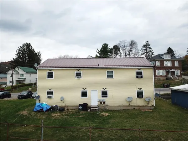 a house view with a garden space