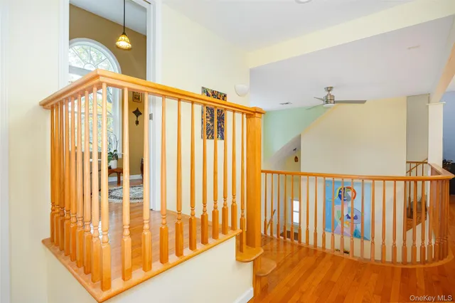 a view of a porch with wooden floor