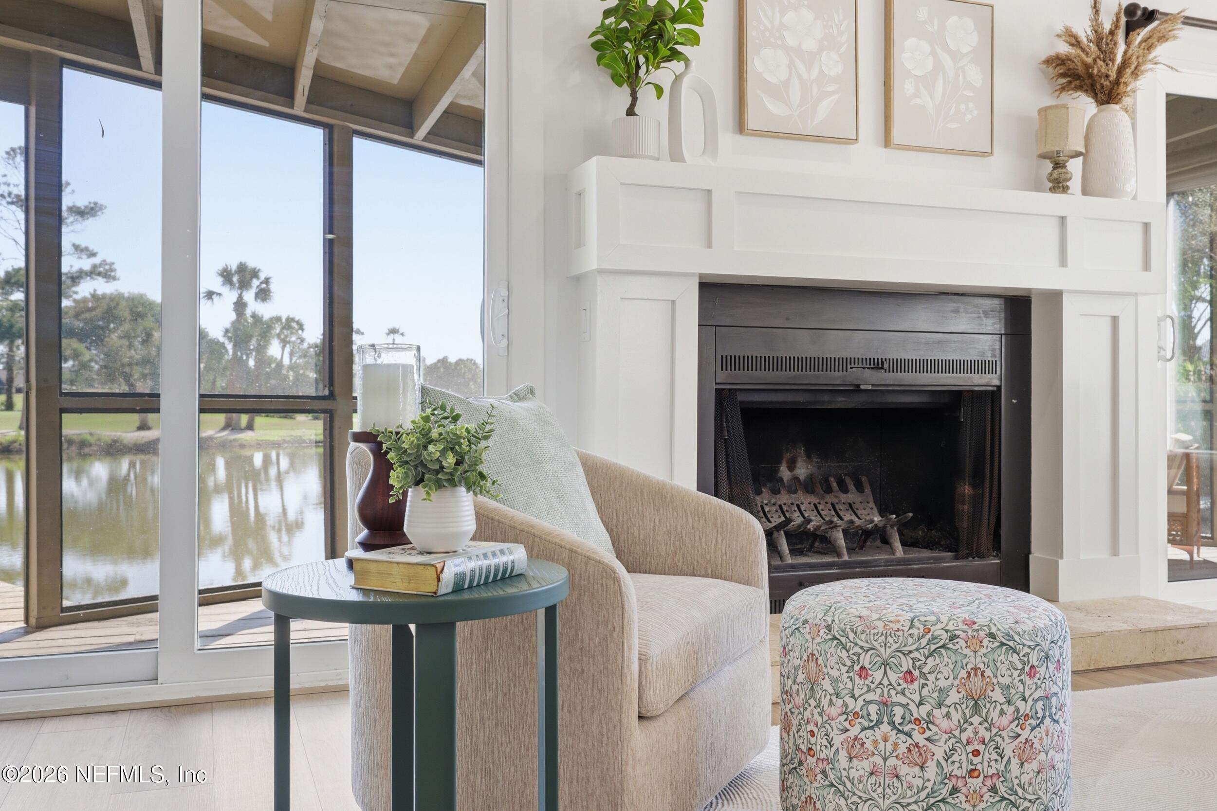 35 Fishermans Cove Road Ponte Vedra Beach, FL 32082 - Photo 17 of 79 Relaxing by the fireplace