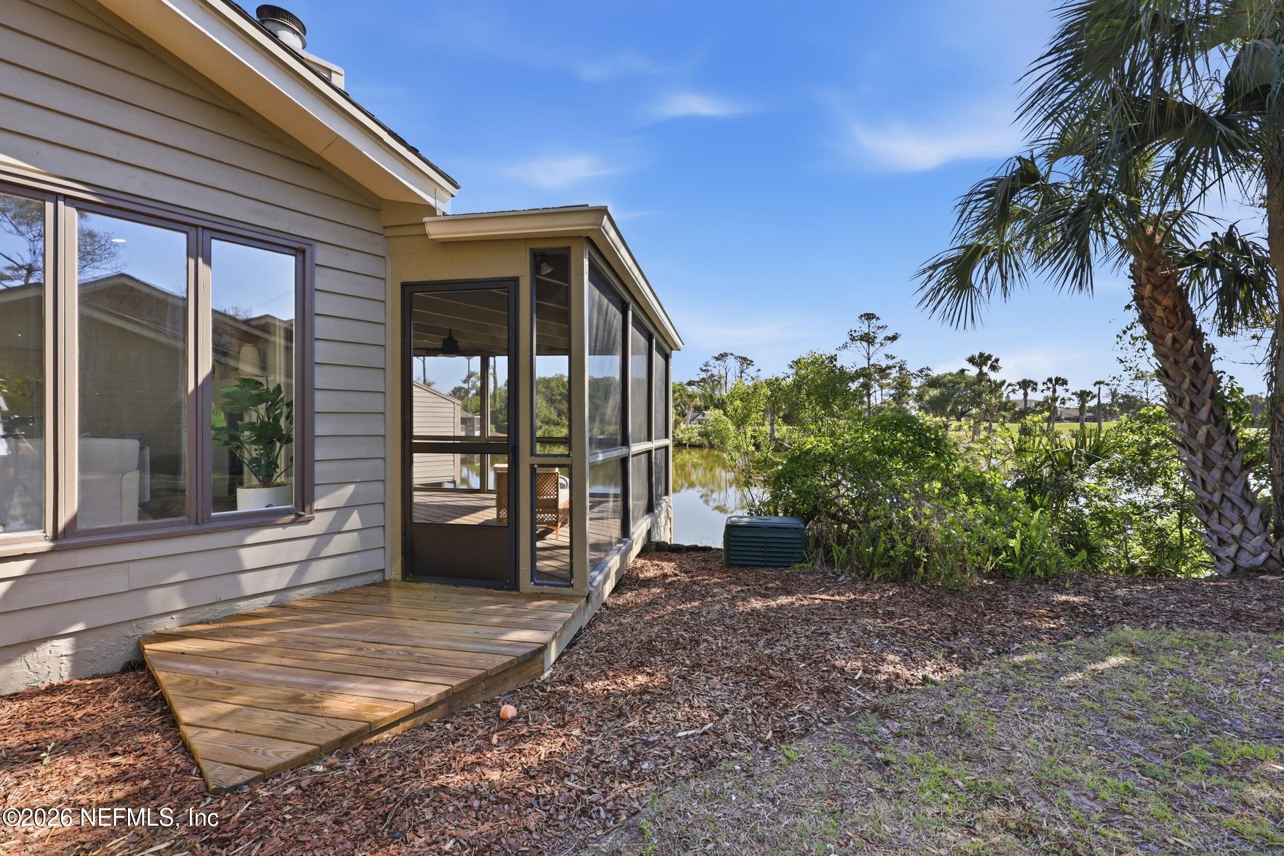 35 Fishermans Cove Road Ponte Vedra Beach, FL 32082 - Photo 36 of 79 Side entrance to the screened in lanai
