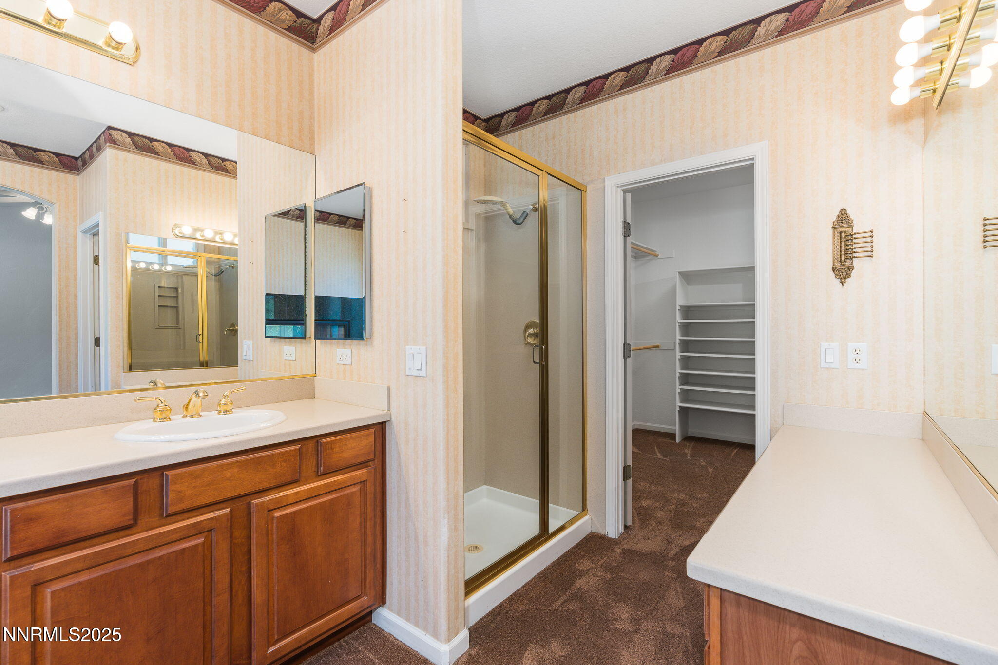 1300 Flanders Road Reno, NV 89511 - Photo 17 of 46 a bathroom with a sink and a mirror