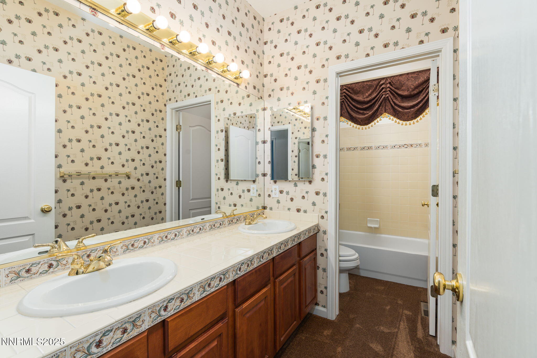 1300 Flanders Road Reno, NV 89511 - Photo 25 of 46 a bathroom with a sink a toilet and a shower