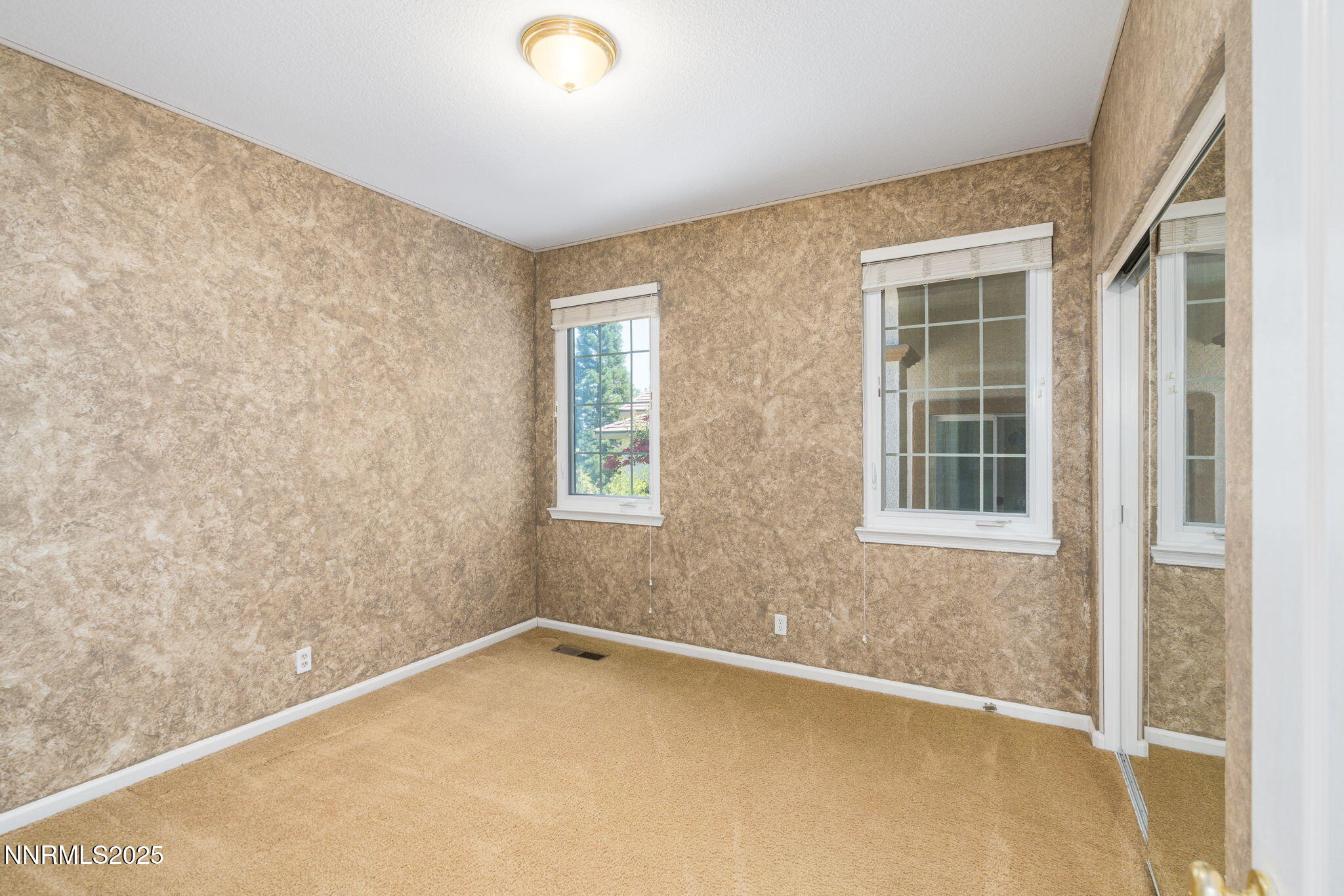 1300 Flanders Road Reno, NV 89511 - Photo 27 of 46 an empty room with a window