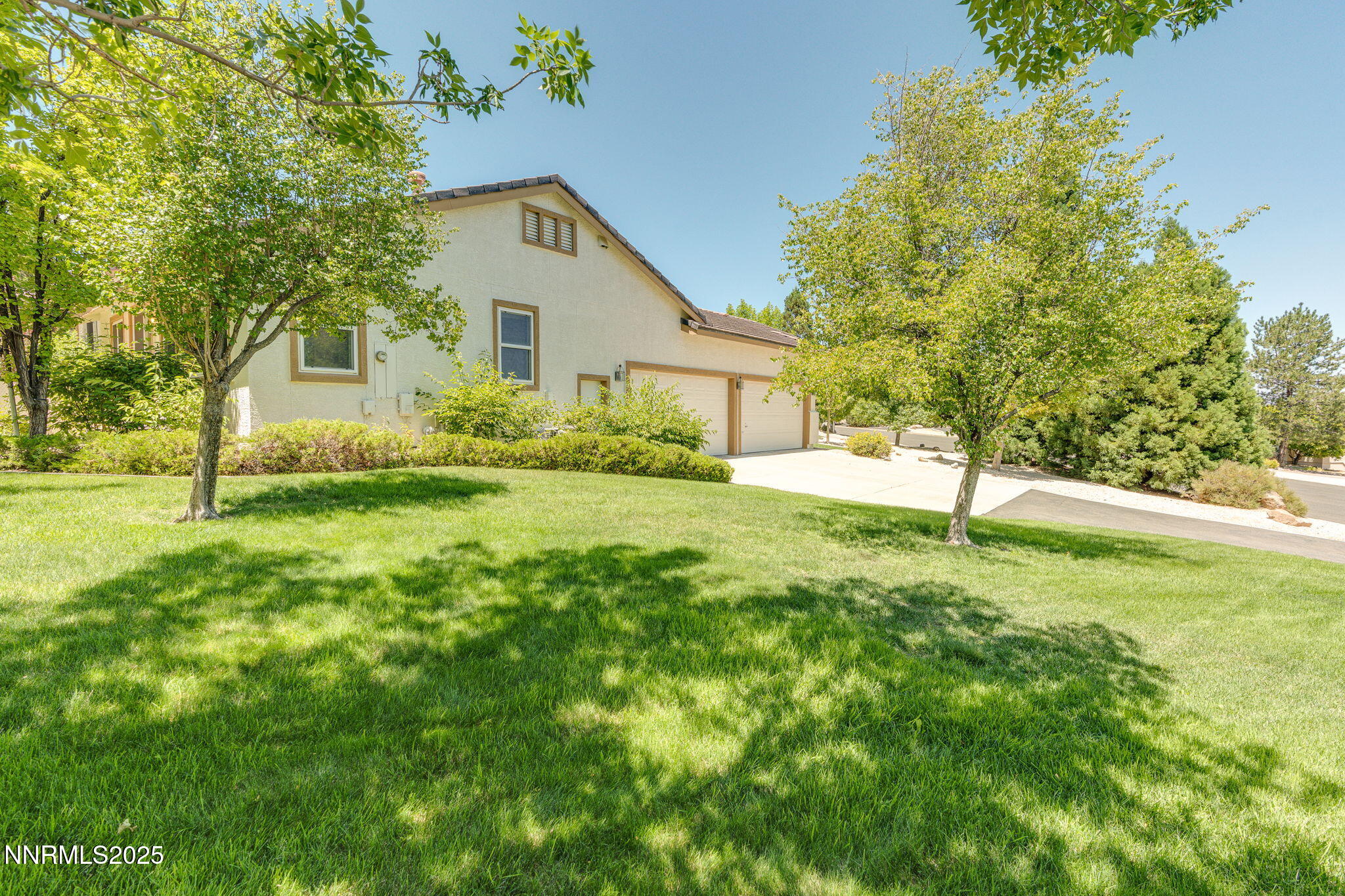 1300 Flanders Road Reno, NV 89511 - Photo 31 of 46 a view of backyard of house with green space