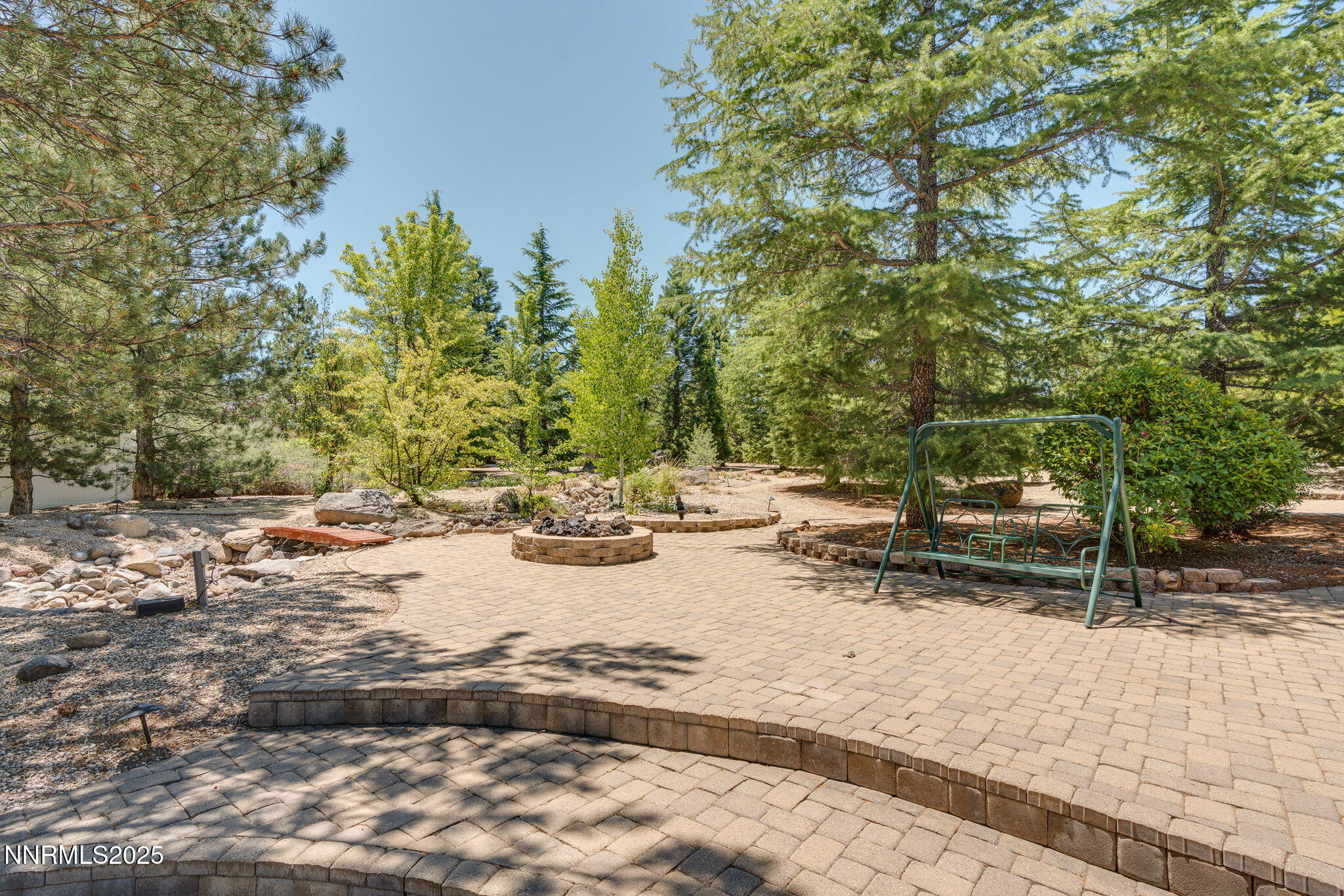 1300 Flanders Road Reno, NV 89511 - Photo 32 of 46 a view of a yard with plants and trees