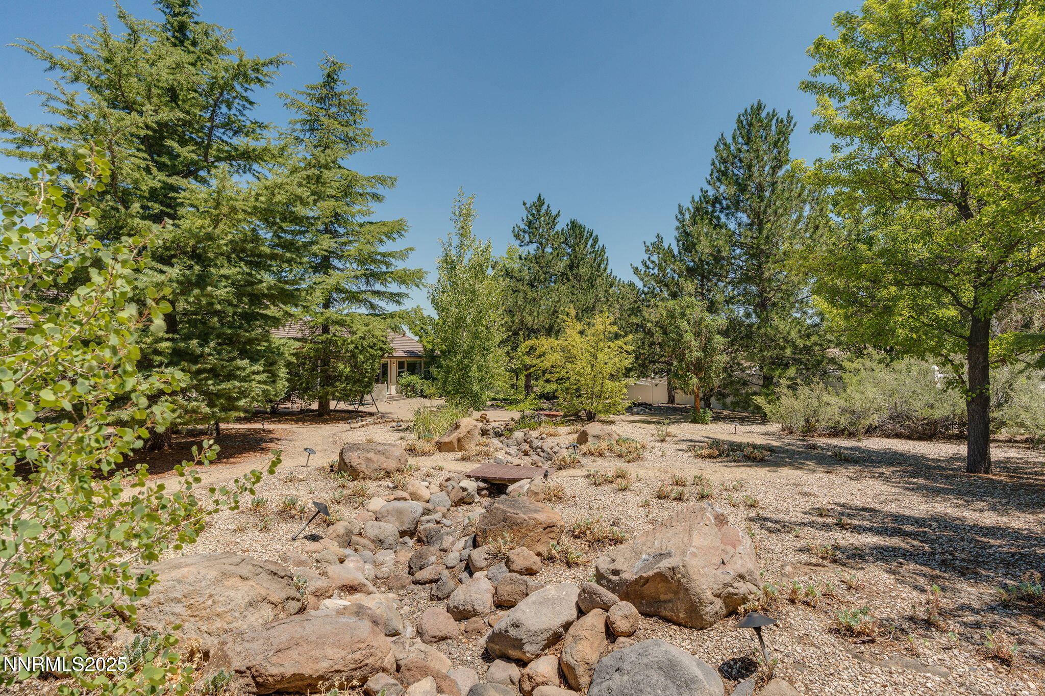 1300 Flanders Road Reno, NV 89511 - Photo 33 of 46 a view of a yard with a tree