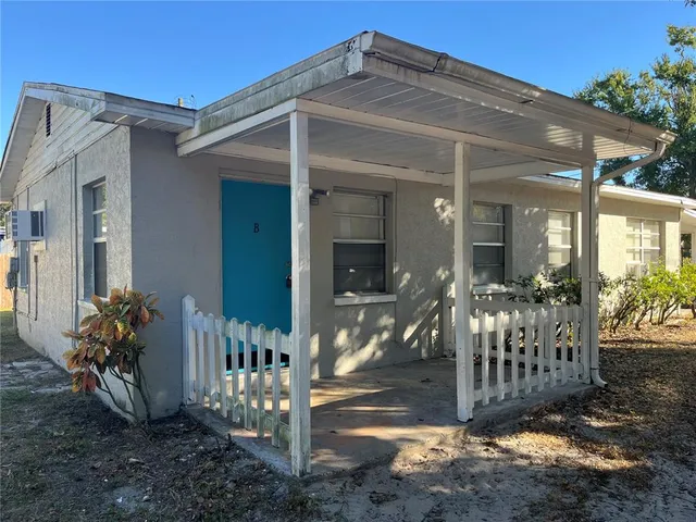 a view of a house with a porch