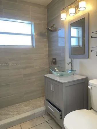 a view of an empty room and stairs