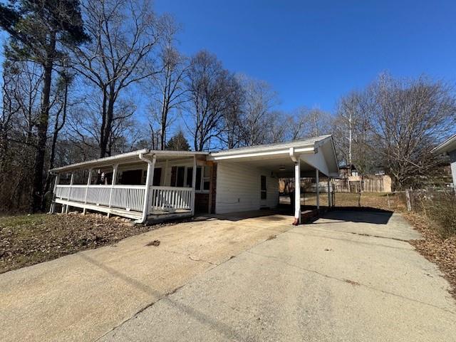 6240 Humphries Hill Road Austell, GA 30106 - Photo 2 of 11 a front view of a house with a yard