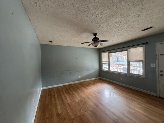 6240 Humphries Hill Road Austell, GA 30106 - Photo 5 of 11 wooden floor in an empty room with a window