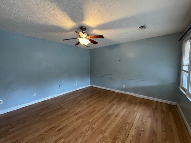 6240 Humphries Hill Road Austell, GA 30106 - Photo 7 of 9 wooden floor in an empty room with a window