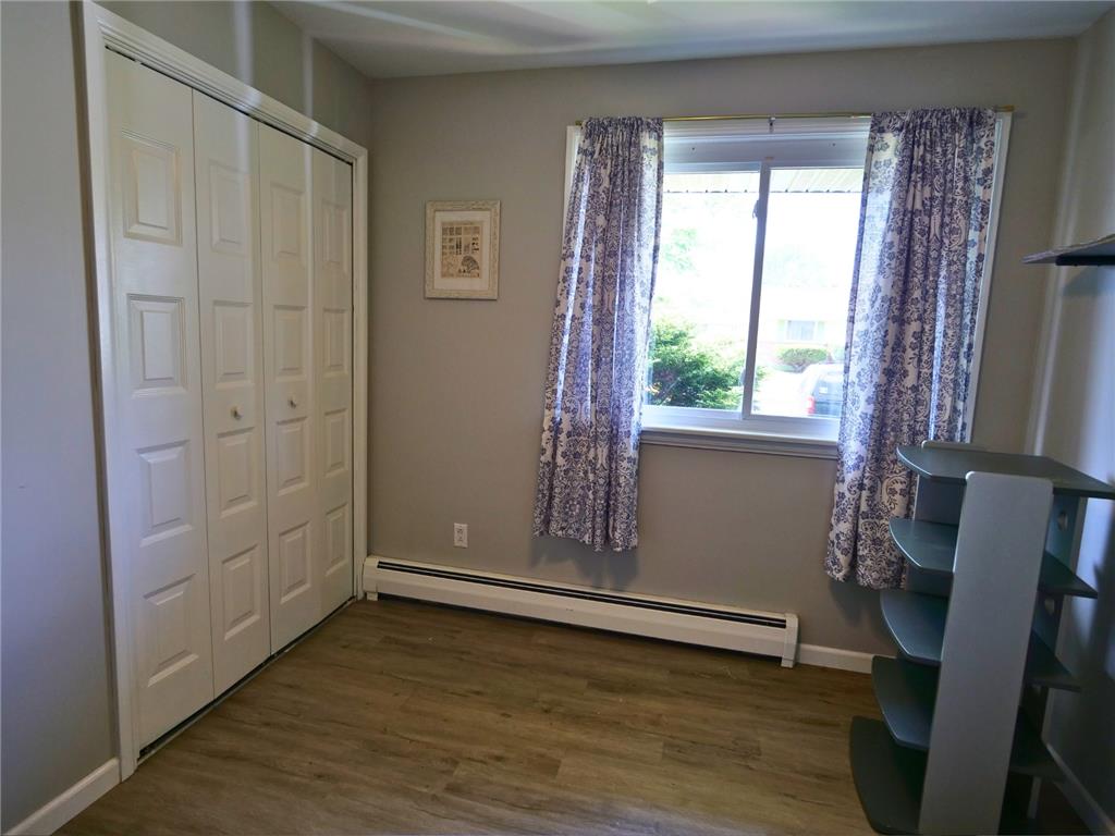 2233 Aster Road Macungie, PA 18062 - Photo 20 of 30 an empty room with wooden floor and windows