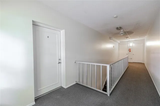 a view of a hallway with closet area