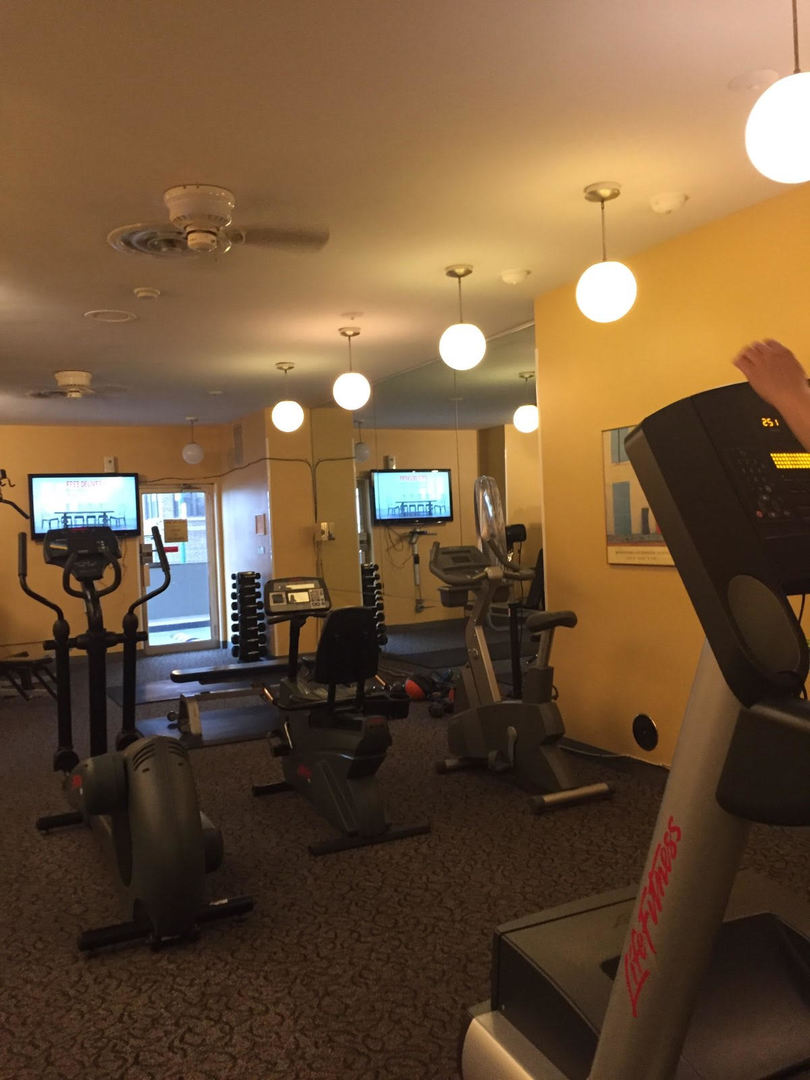 6301 North Sheridan Road, Unit 10L Chicago, IL 60660 - Photo 10 of 14 a view of a room with gym equipment