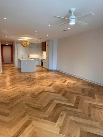 a view of a kitchen with a sink