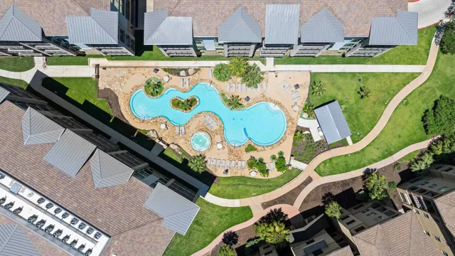 an aerial view of a swimming pool