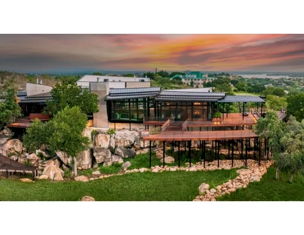a view of a chairs and table in a room