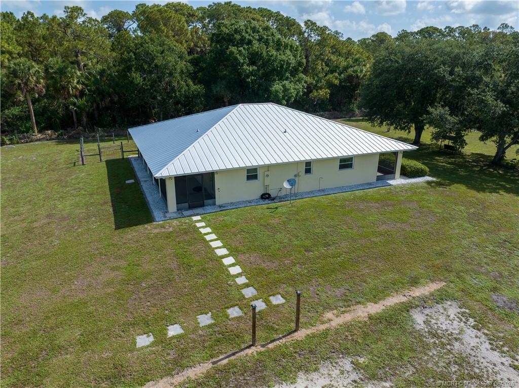 8200 Southwest Springhaven Avenue Indiantown, FL 34956 - Photo 2 of 35 a aerial view of a house