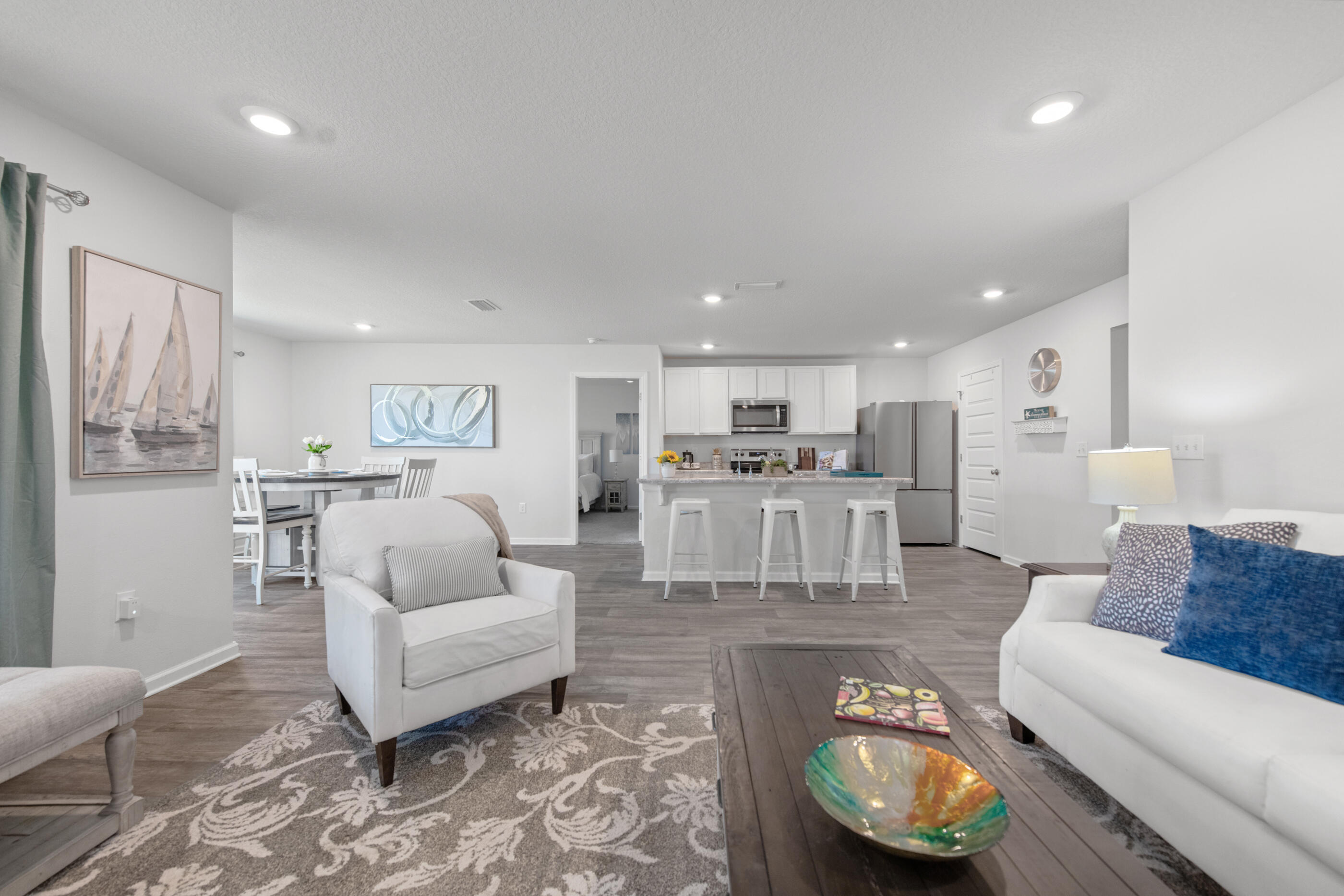 193 This Way Freeport, FL 32439 - Photo 1 of 56 a living room with furniture and a view of kitchen