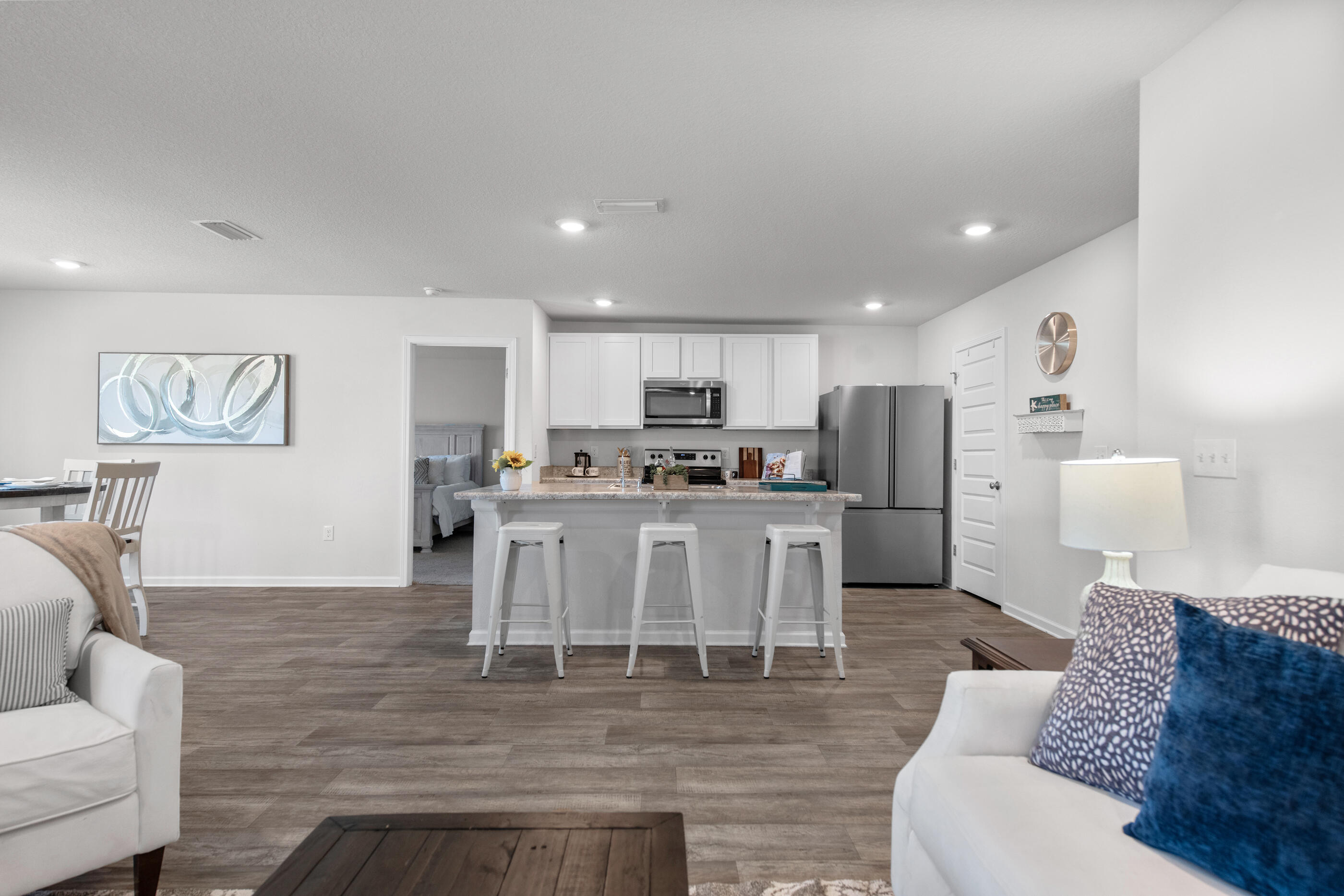 193 This Way Freeport, FL 32439 - Photo 18 of 56 a living room with stainless steel appliances kitchen island furniture and a view of kitchen
