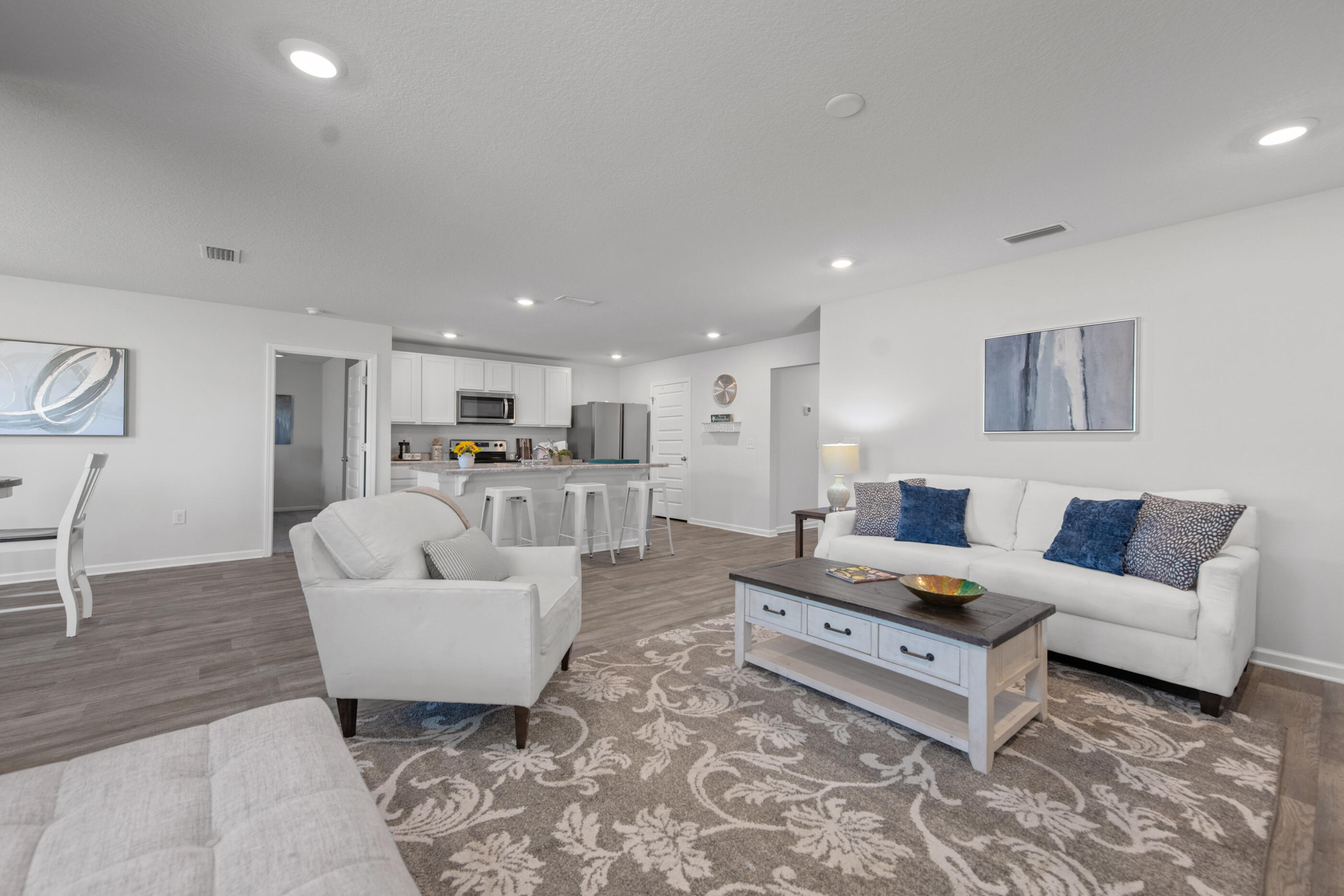 193 This Way Freeport, FL 32439 - Photo 20 of 56 a living room with furniture and a table