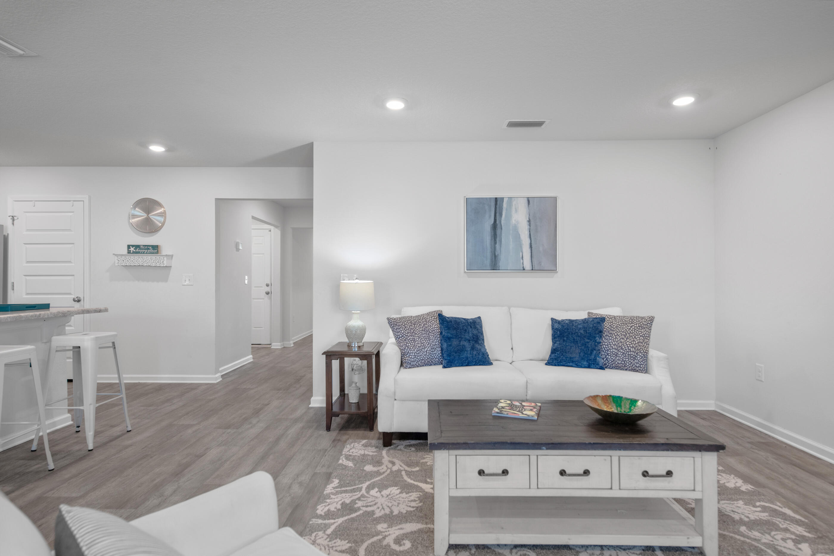 193 This Way Freeport, FL 32439 - Photo 21 of 56 a living room with furniture and wooden floor